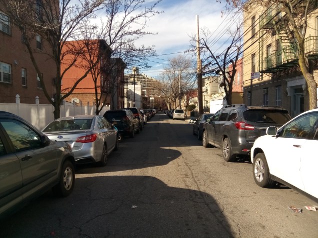 a look west from 21st street down one of those Astoria sidestreets just south of the bridge and park. peeking view of shore towers